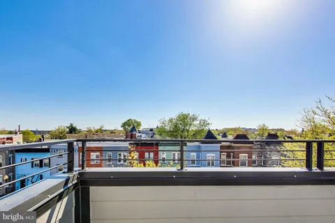 a view of a lake from a balcony
