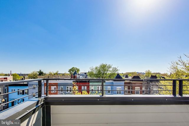 a view of a lake from a balcony
