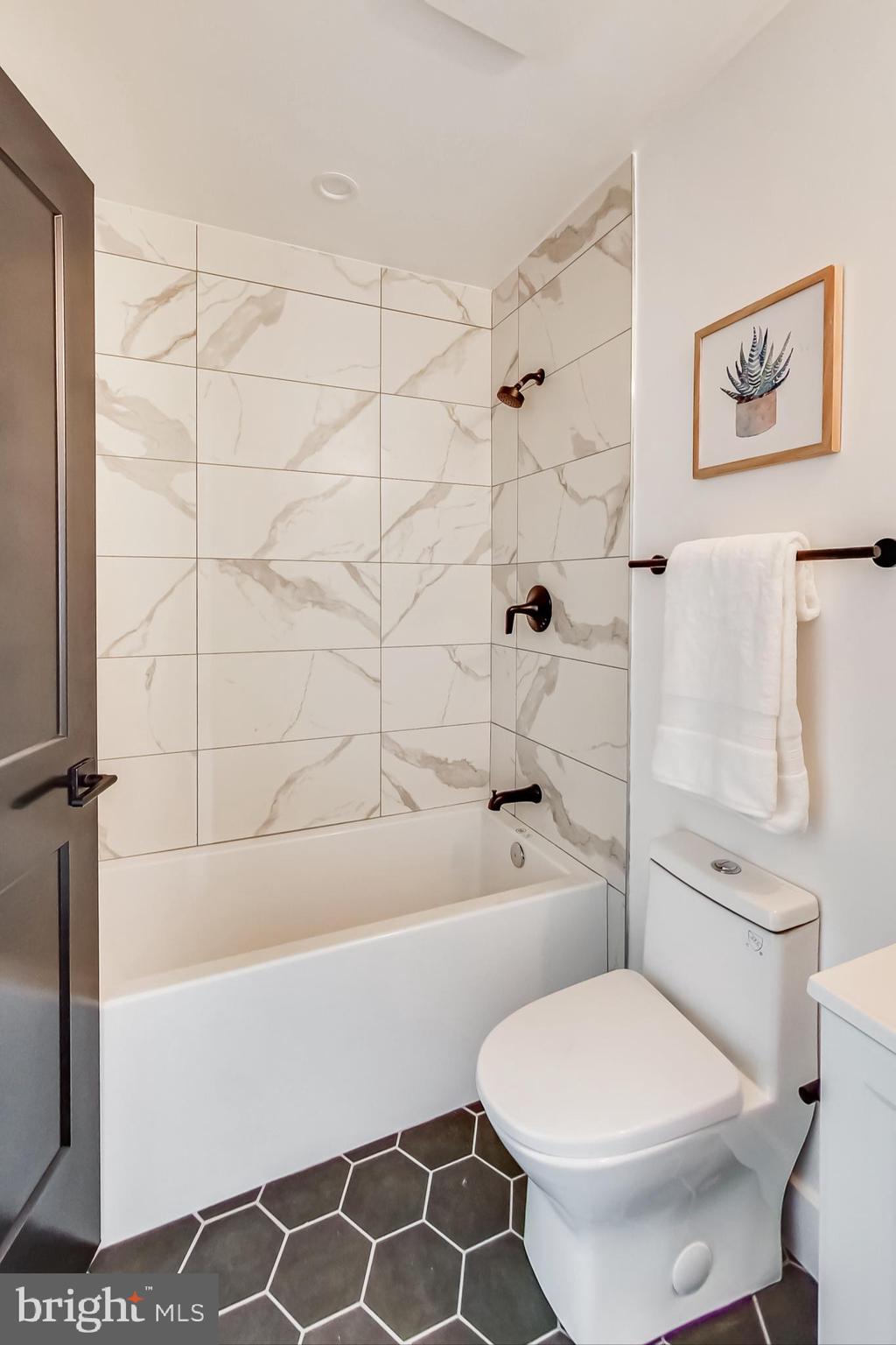 207 Florida Avenue Northwest, Unit 3 Washington, DC 20001 - Photo 29 of 34 a bathroom with a toilet and a shower