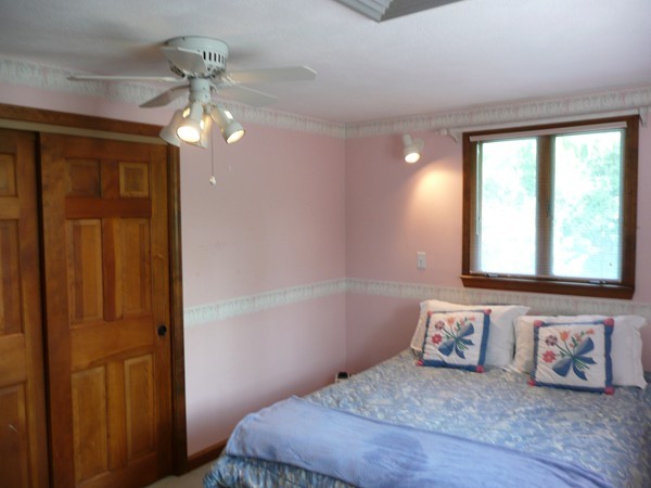 11 Barrett Road Lexington, MA 02421 - Photo 13 of 14 a bedroom with a bed and a window