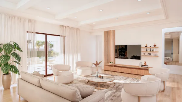 a living room with furniture and a flat screen tv
