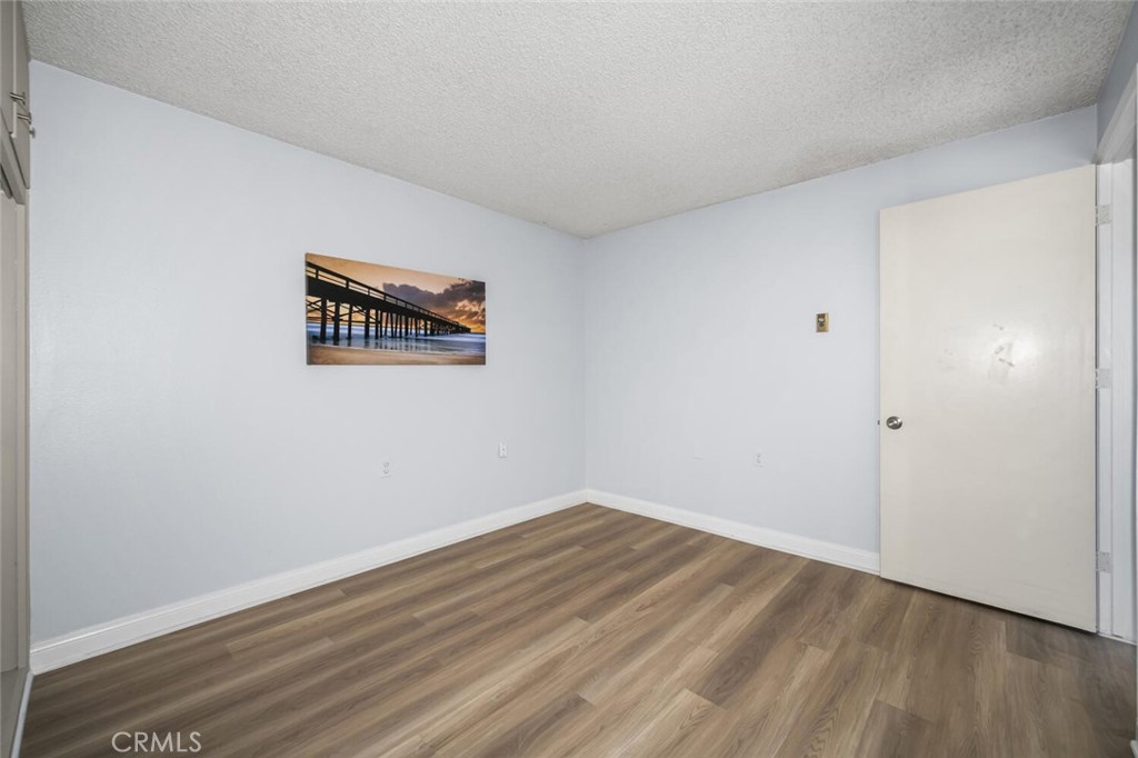 13120 Del Monte Drive, Unit 47G Seal Beach, CA 90740 - Photo 25 of 42 a view of a room with wooden floor