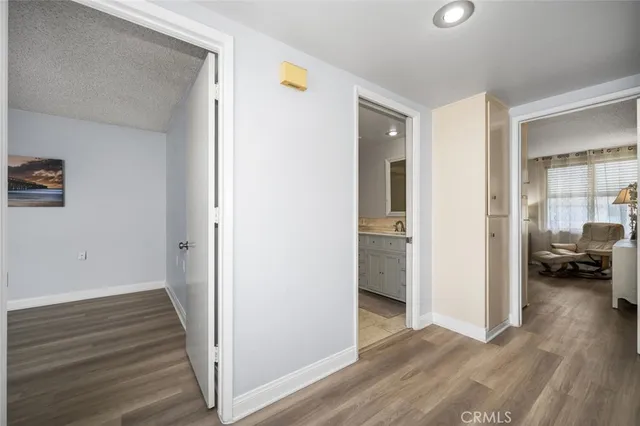 a view of a livingroom from the hallway