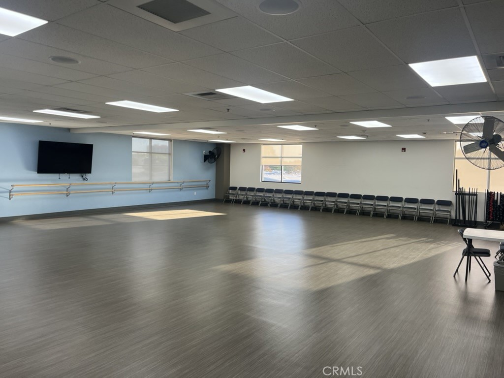 13120 Del Monte Drive, Unit 47G Seal Beach, CA 90740 - Photo 42 of 42 a view of a kitchen with a sink and a floor to ceiling window