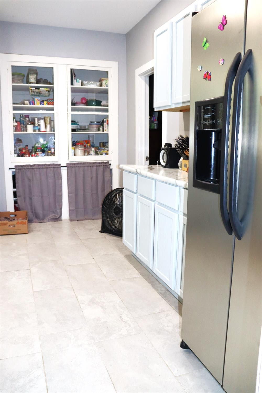 528 Mount Street Gary, IN 46406 - Photo 12 of 29 a kitchen with stainless steel appliances kitchen island granite countertop a refrigerator a stove a sink and a cabinets