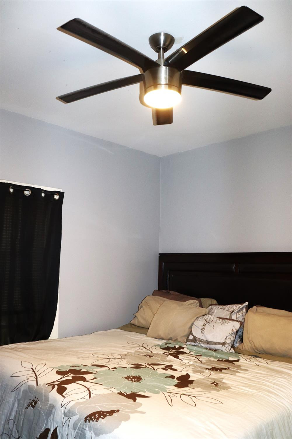 528 Mount Street Gary, IN 46406 - Photo 16 of 29 a bedroom with a bed and a view of kitchen