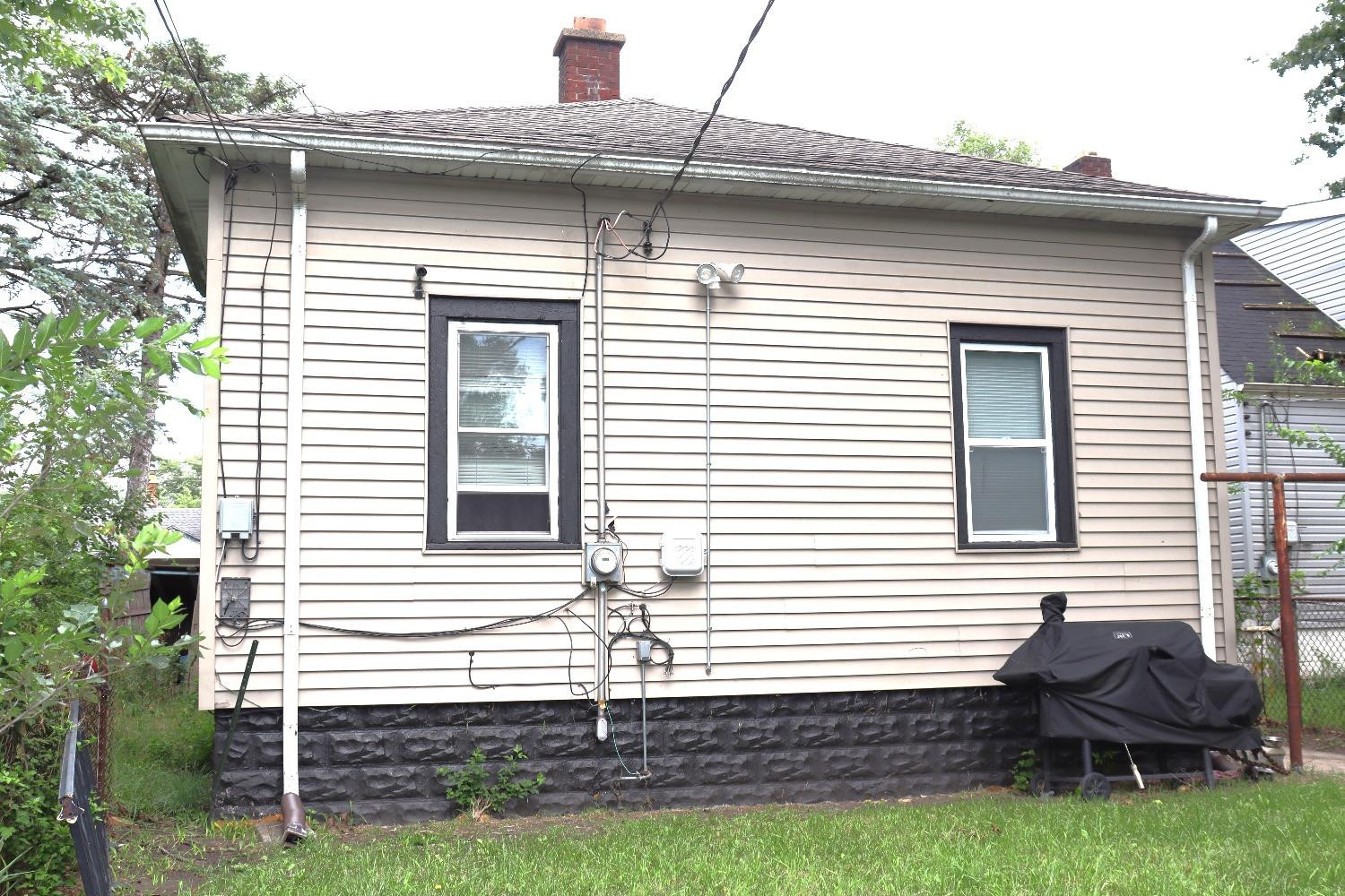 528 Mount Street Gary, IN 46406 - Photo 26 of 29 a view of a house with a yard and a porch