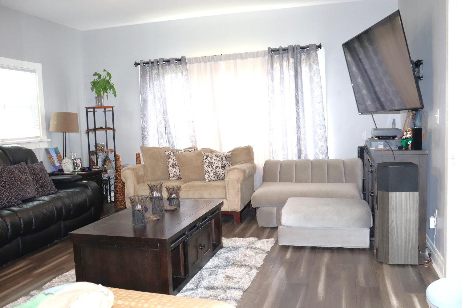 528 Mount Street Gary, IN 46406 - Photo 4 of 29 a living room with furniture and a large window