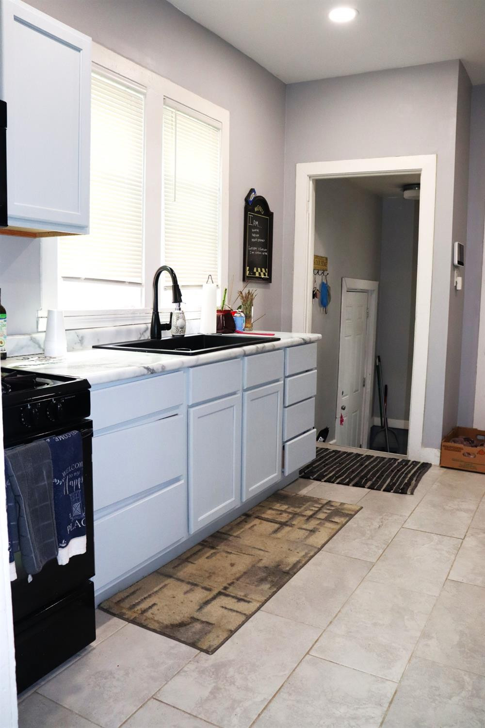 528 Mount Street Gary, IN 46406 - Photo 10 of 29 a bedroom with a bed and a double vanity sink