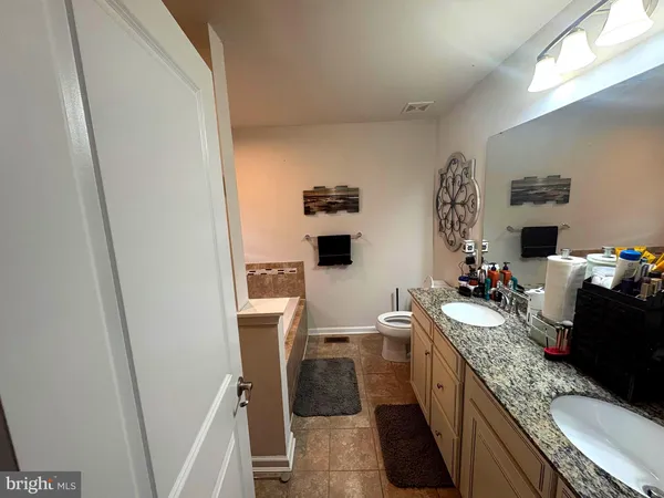 a kitchen with a sink stove and refrigerator