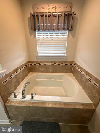 a bathroom with a bathtub