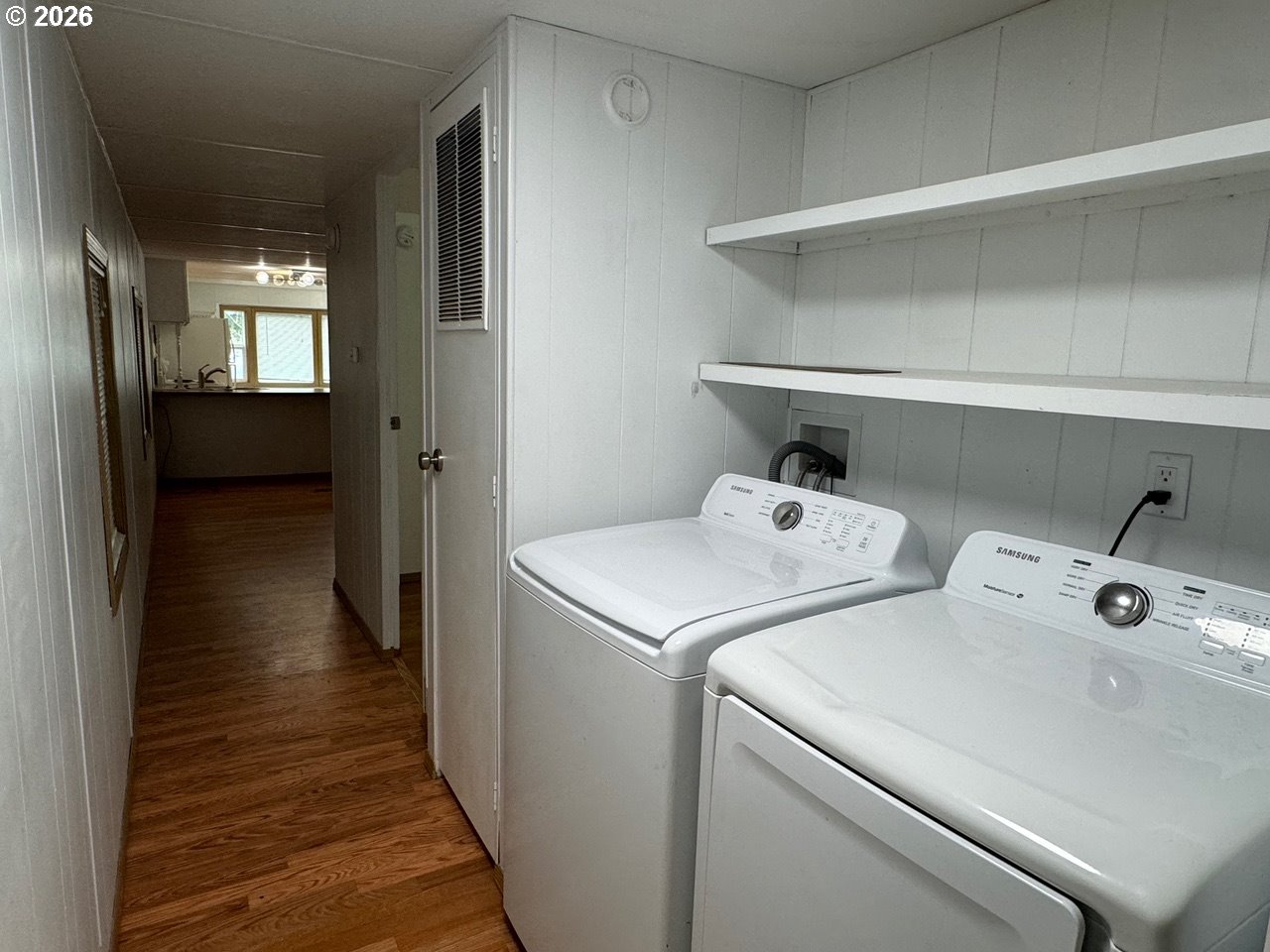 1600 Rhododendron Drive, Unit 293 Florence, OR 97439 - Photo 22 of 26 a utility room with dryer and washer