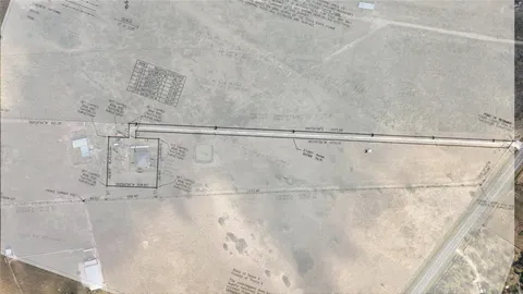 an aerial view of residential house and beach