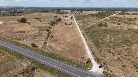 a view of a lake from a yard