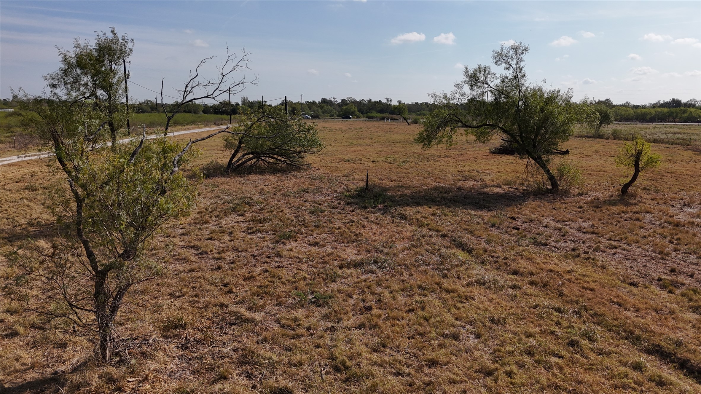14777 Farm To Market 359 Hempstead, TX 77445 - Photo 8 of 18 a view of a lake from a yard