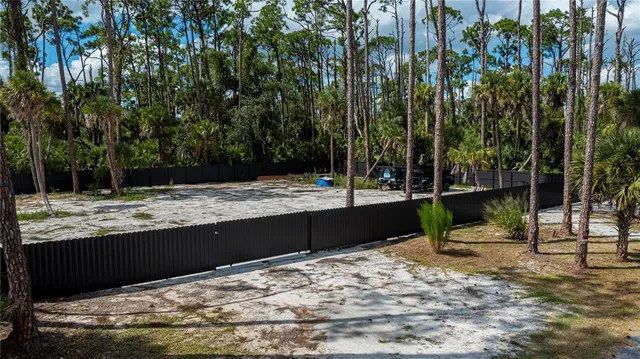 a view of swimming pool with a patio
