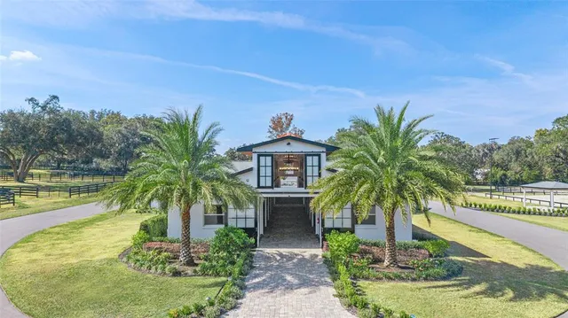a front view of house with yard and entertaining space