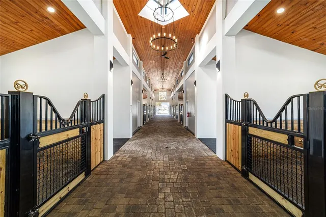 a view of a hallway with staircase