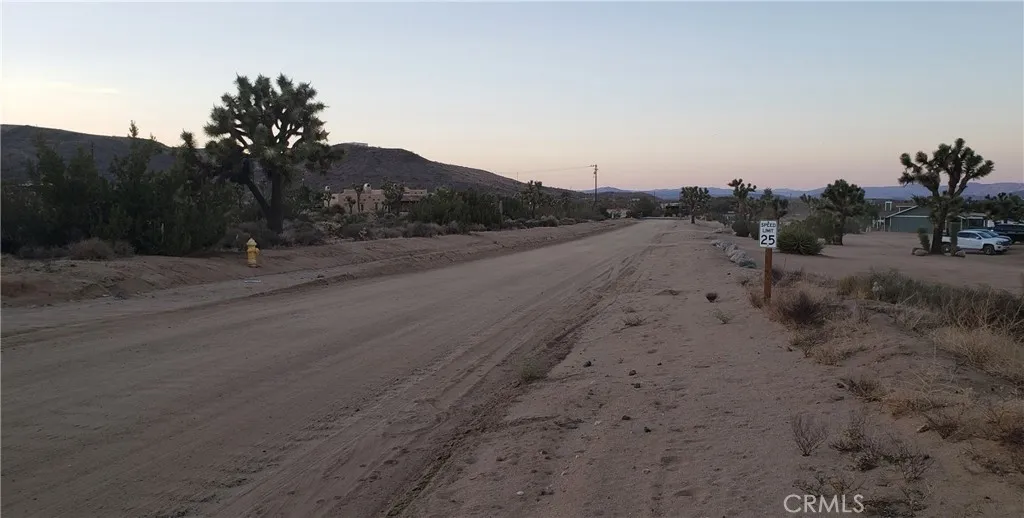 1234 Canton Street Yucca Valley, CA 92284 - Photo 19 of 27 a view of a road with a mountain