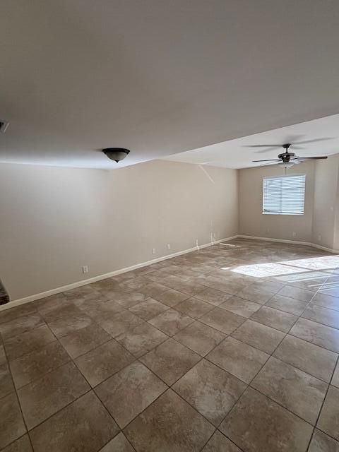 6191 Riverwalk Lane, Unit 4 Jupiter, FL 33458 - Photo 6 of 16 an empty room with a empty space and windows