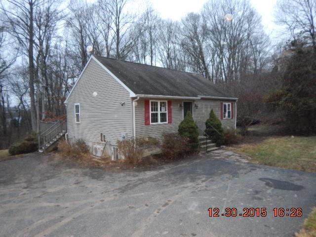 23 Lookout Hill Road Old Saybrook, CT 06475 - Photo 1 of 1 a front view of a house with garden
