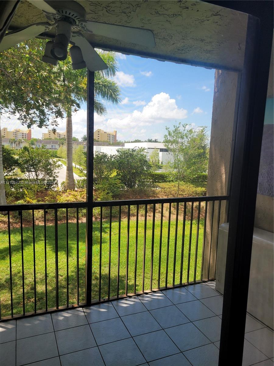 370 Racquet Club Road, Unit 204 Weston, FL 33326 - Photo 3 of 12 a view of balcony with furniture