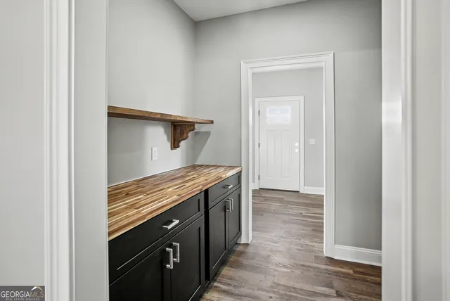 a view of a kitchen from the hallway
