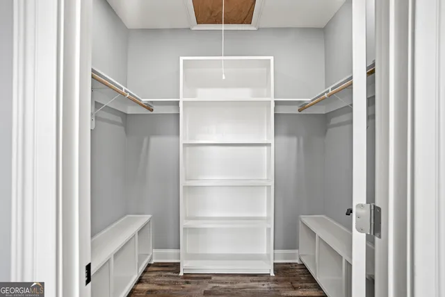 a view of an empty walk in closet