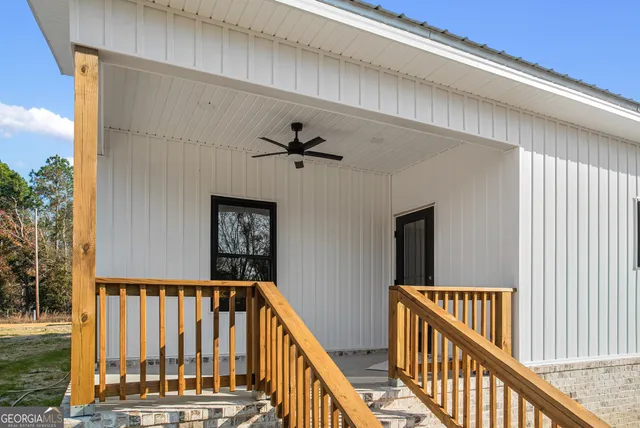 a view of a hallway with a window