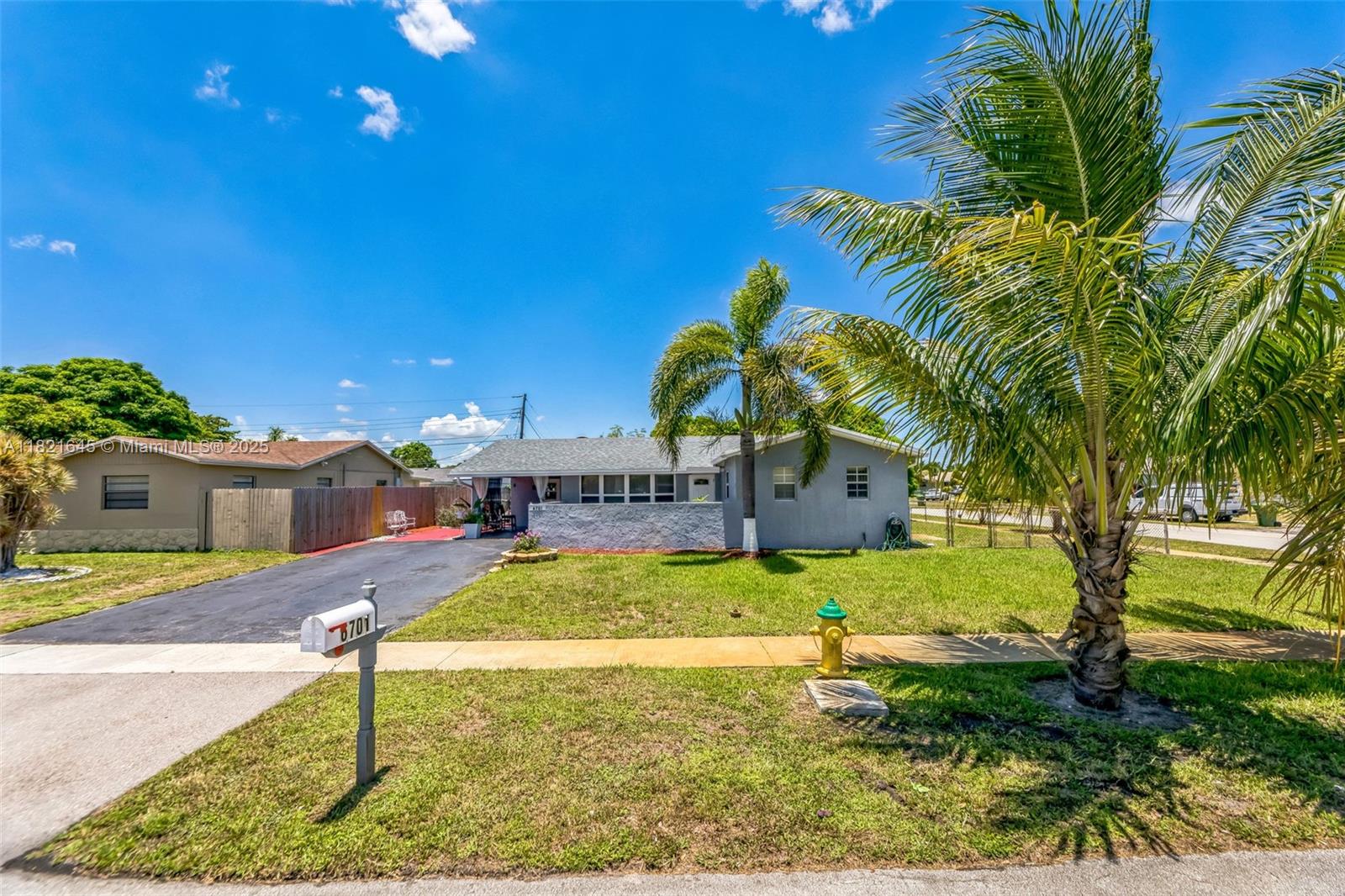 a swimming pool with outdoor seating and yard