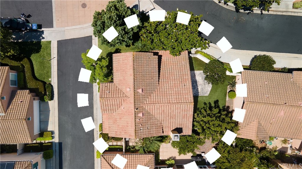 26 Le Vanto Irvine, CA 92606 - Photo 31 of 31 an aerial view of a residential apartment building with a yard and balcony