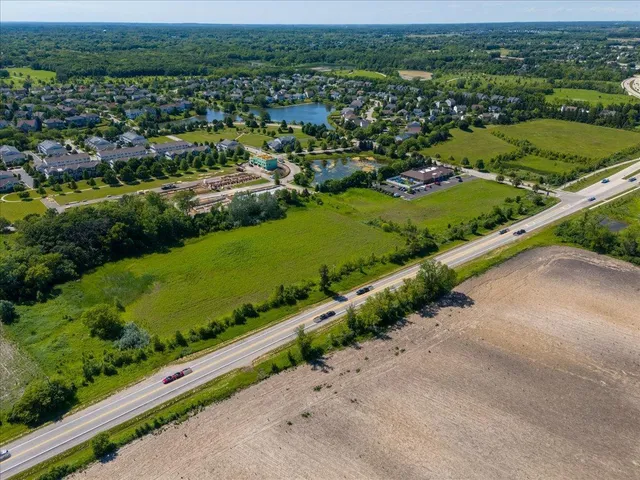 an aerial view of a city with lots of residential buildings