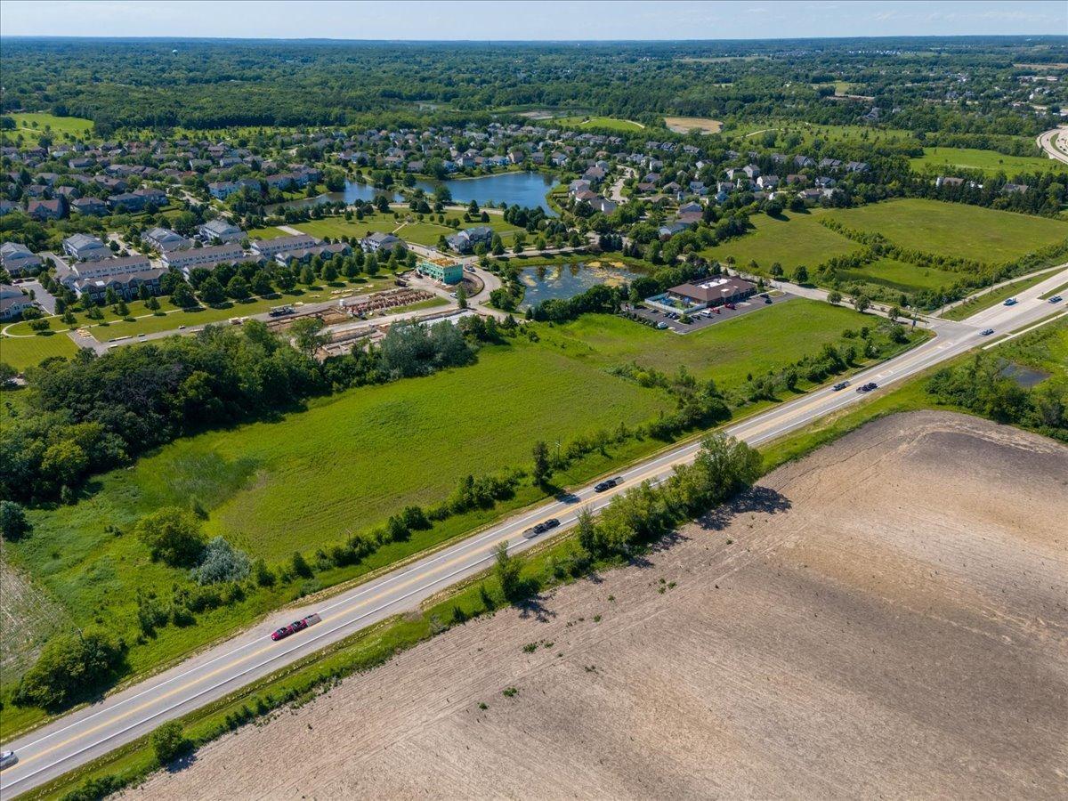 40 Highway 45 Lindenhurst, IL 60046 - Photo 6 of 11 an aerial view of a city with lots of residential buildings