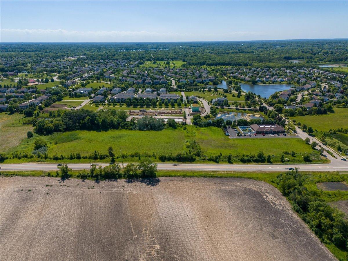 40 Highway 45 Lindenhurst, IL 60046 - Photo 7 of 11 an aerial view of a city with lots of residential buildings