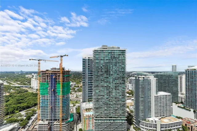 a view of a city with tall buildings