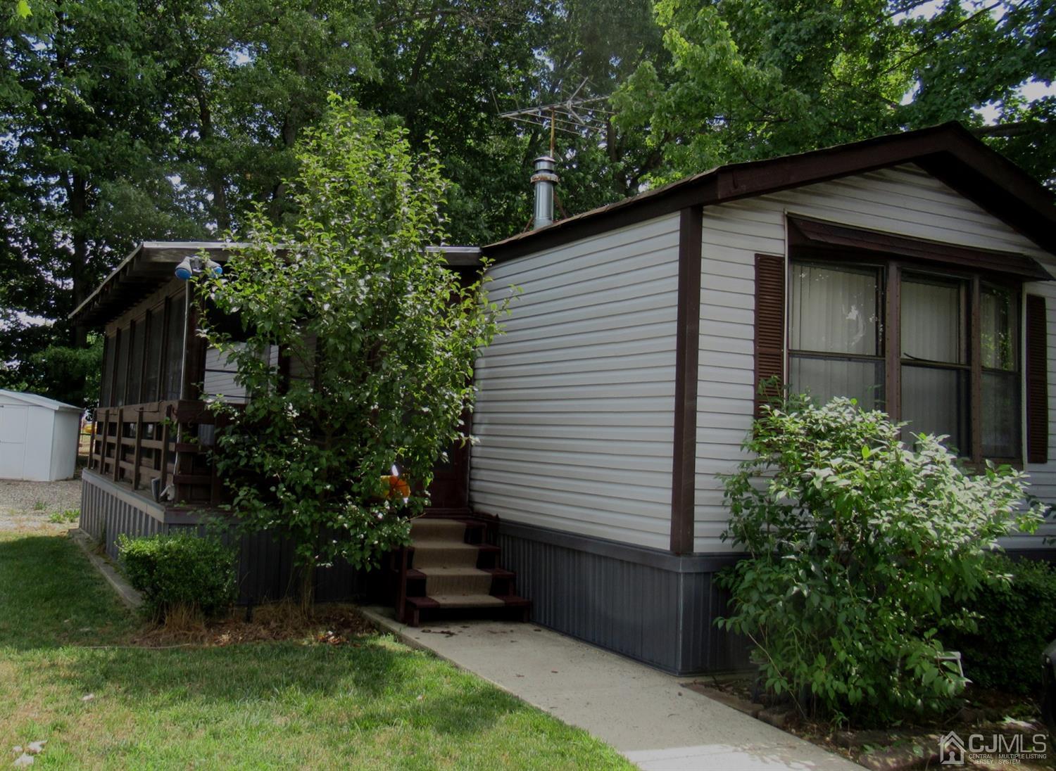 22 Emerson Road North Brunswick, NJ 08902 - Photo 2 of 14 a view of a house with a yard