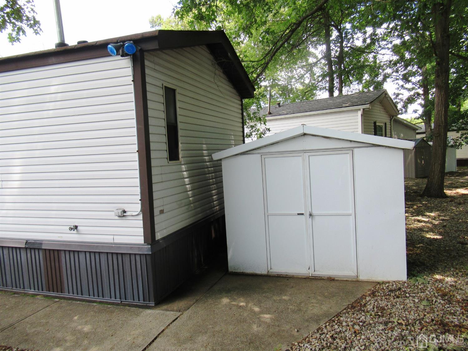 22 Emerson Road North Brunswick, NJ 08902 - Photo 12 of 14 a view of backyard with cabin