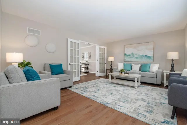 a living room with furniture and a couch