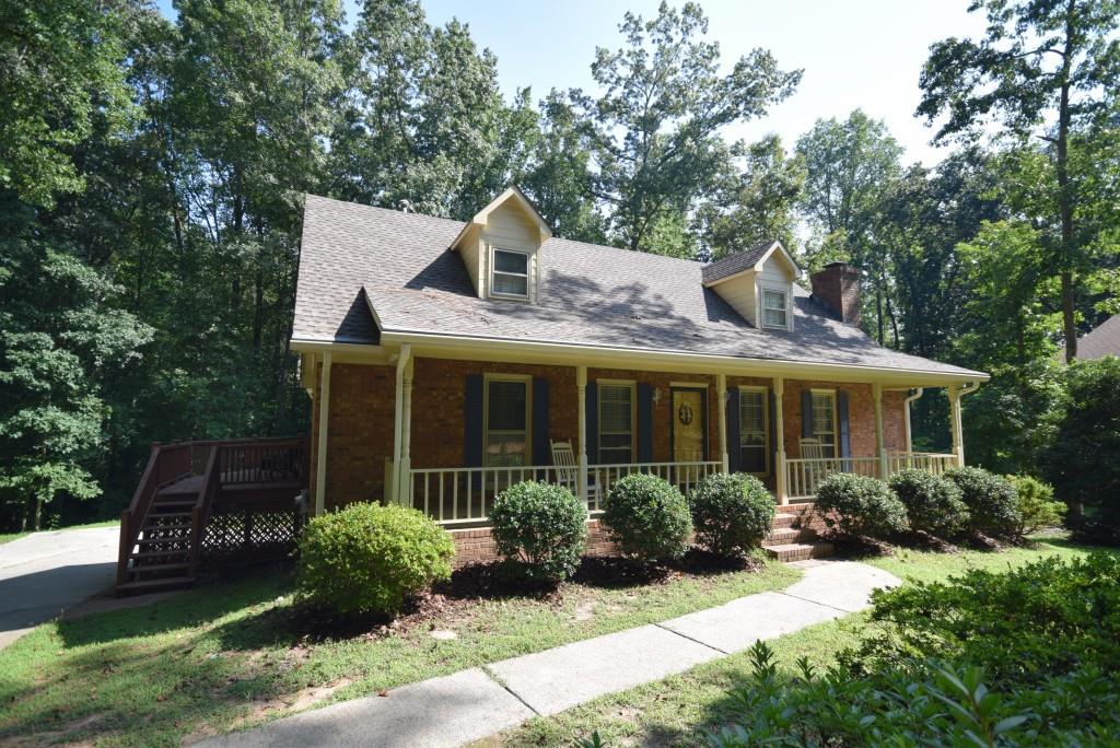 1489 Kincaid Road Marietta, GA 30066 - Photo 1 of 1 Charming 3bed/2bath Cape Cod with on private wooded lot.