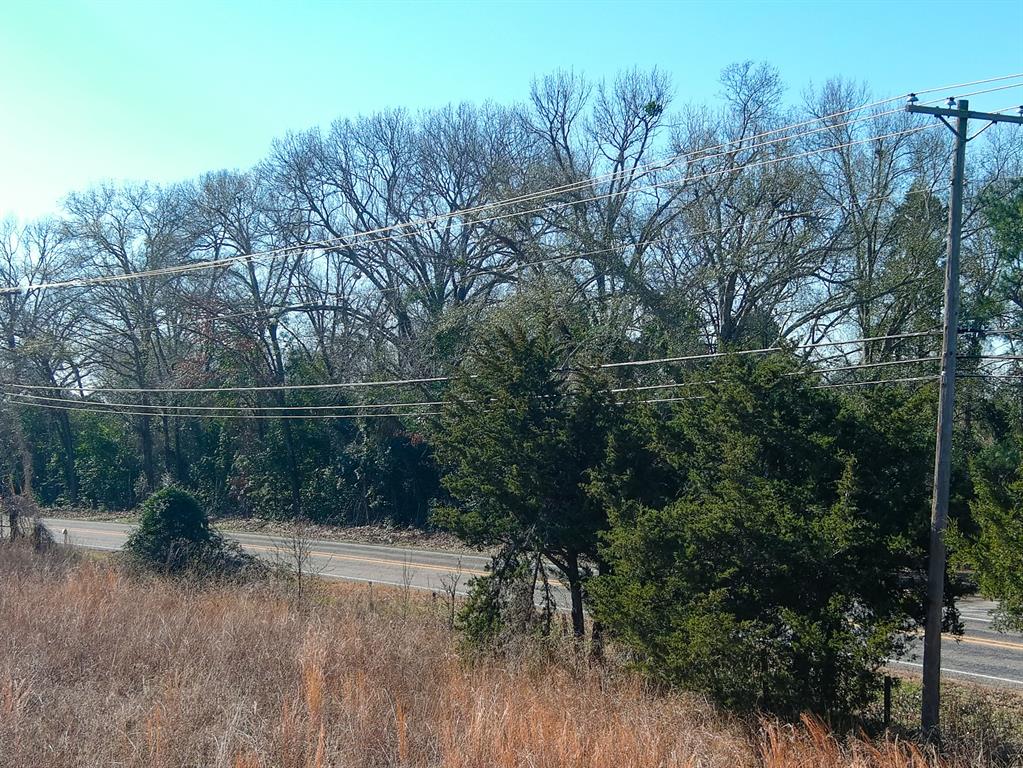 0 Fm 14 Tyler, TX 75706 - Photo 9 of 10 a backyard of a house with a yard and outdoor seating
