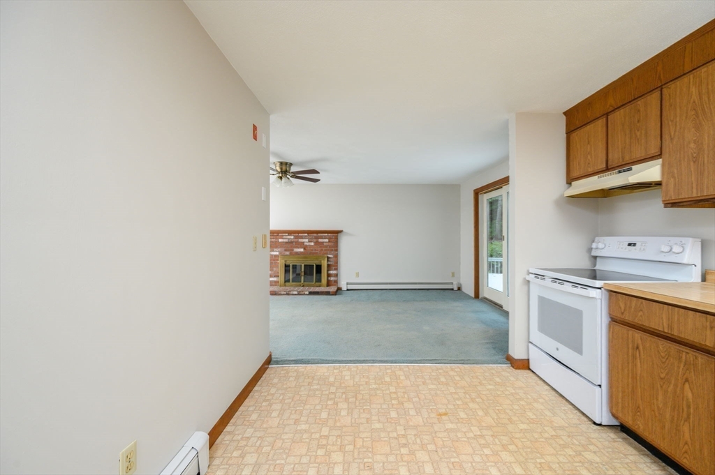 4 Easting Road Bourne, MA 02532 - Photo 15 of 42 a view of a kitchen with a sink cabinets and a window