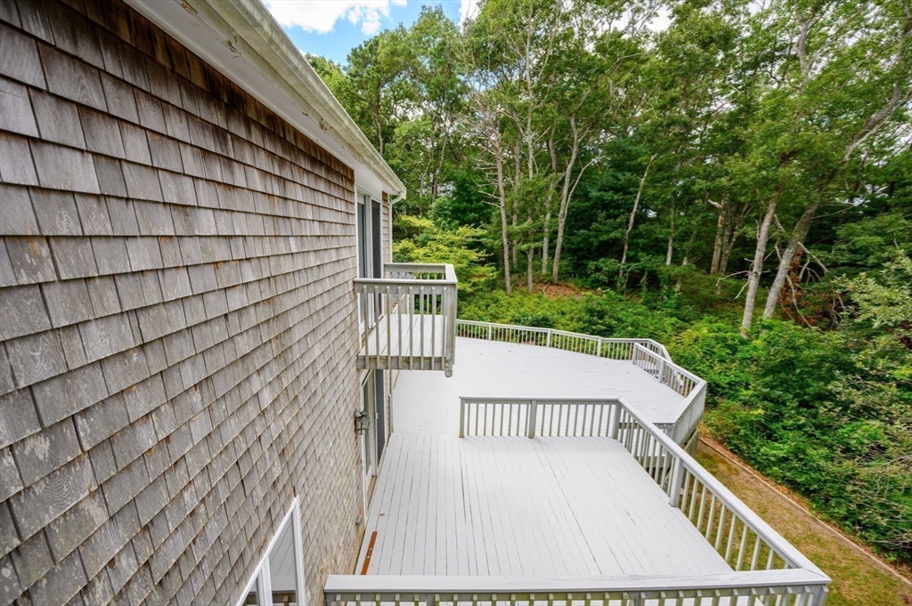 4 Easting Road Bourne, MA 02532 - Photo 27 of 42 a view of balcony with wooden floor and fence