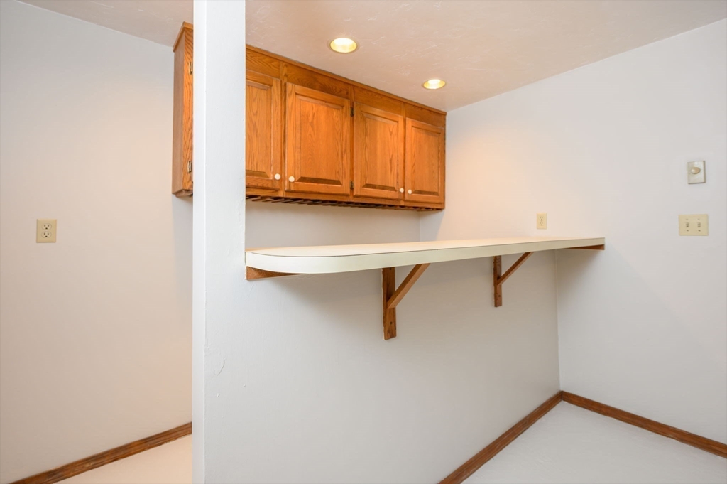 4 Easting Road Bourne, MA 02532 - Photo 31 of 42 a view of walk in closet with empty racks