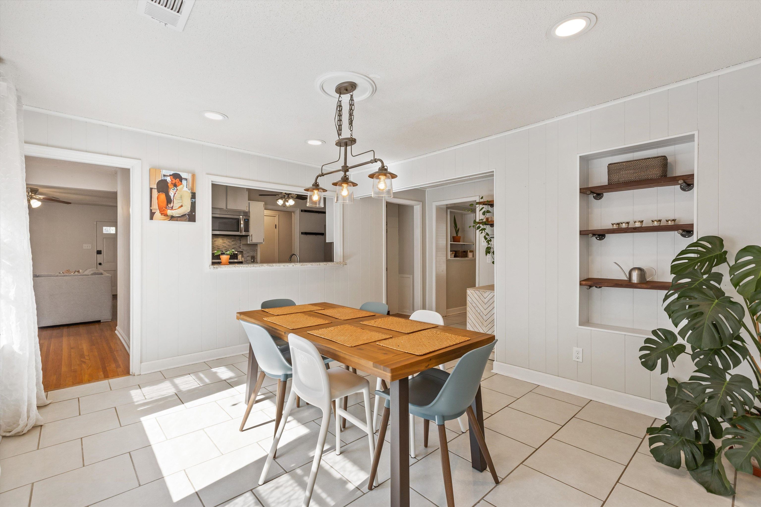 4506 Verne Road Memphis, TN 38117 - Photo 11 of 40 a view of a dining room with furniture and wooden floor