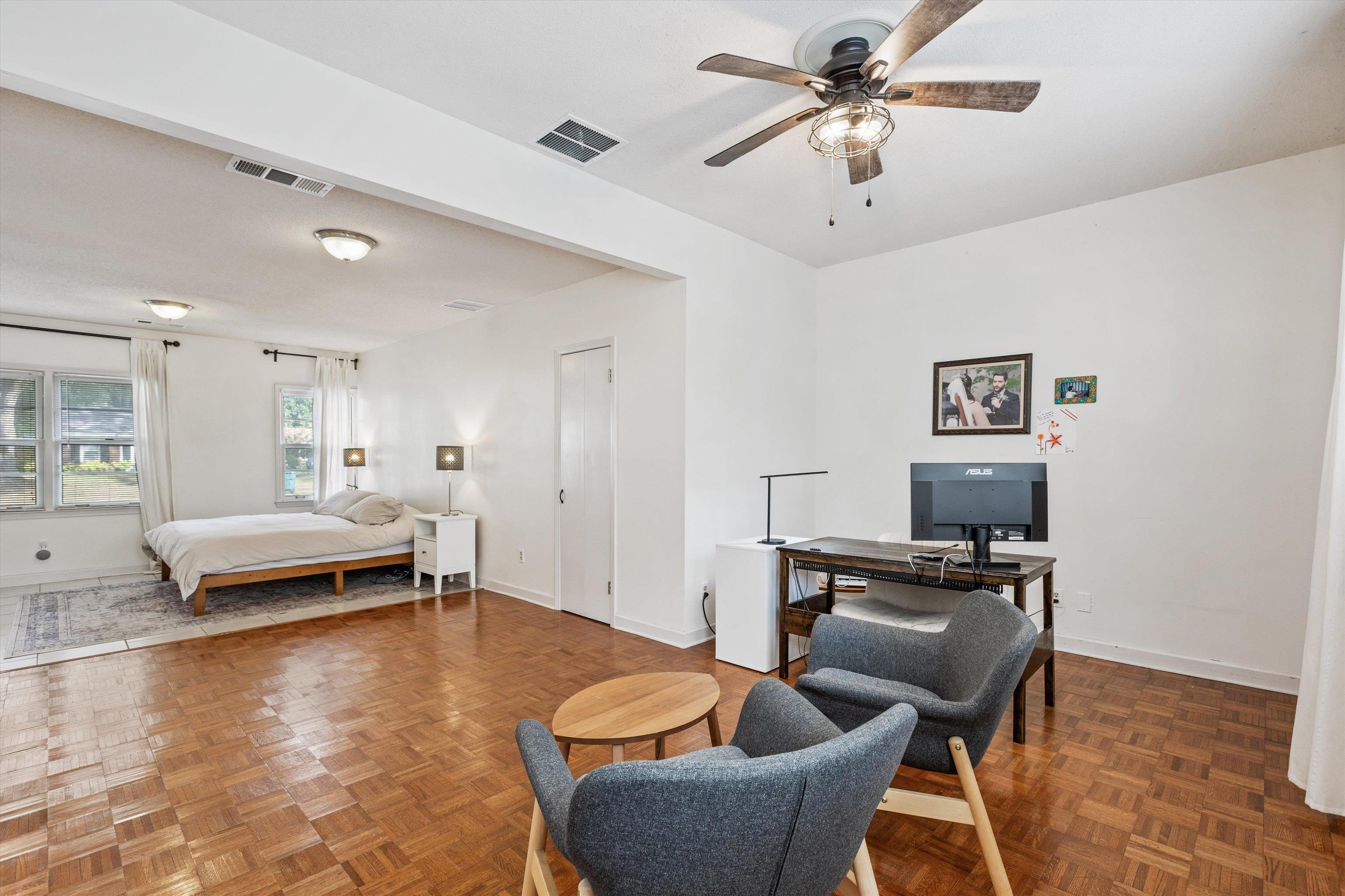 4506 Verne Road Memphis, TN 38117 - Photo 17 of 40 a living room with furniture and a wooden floor