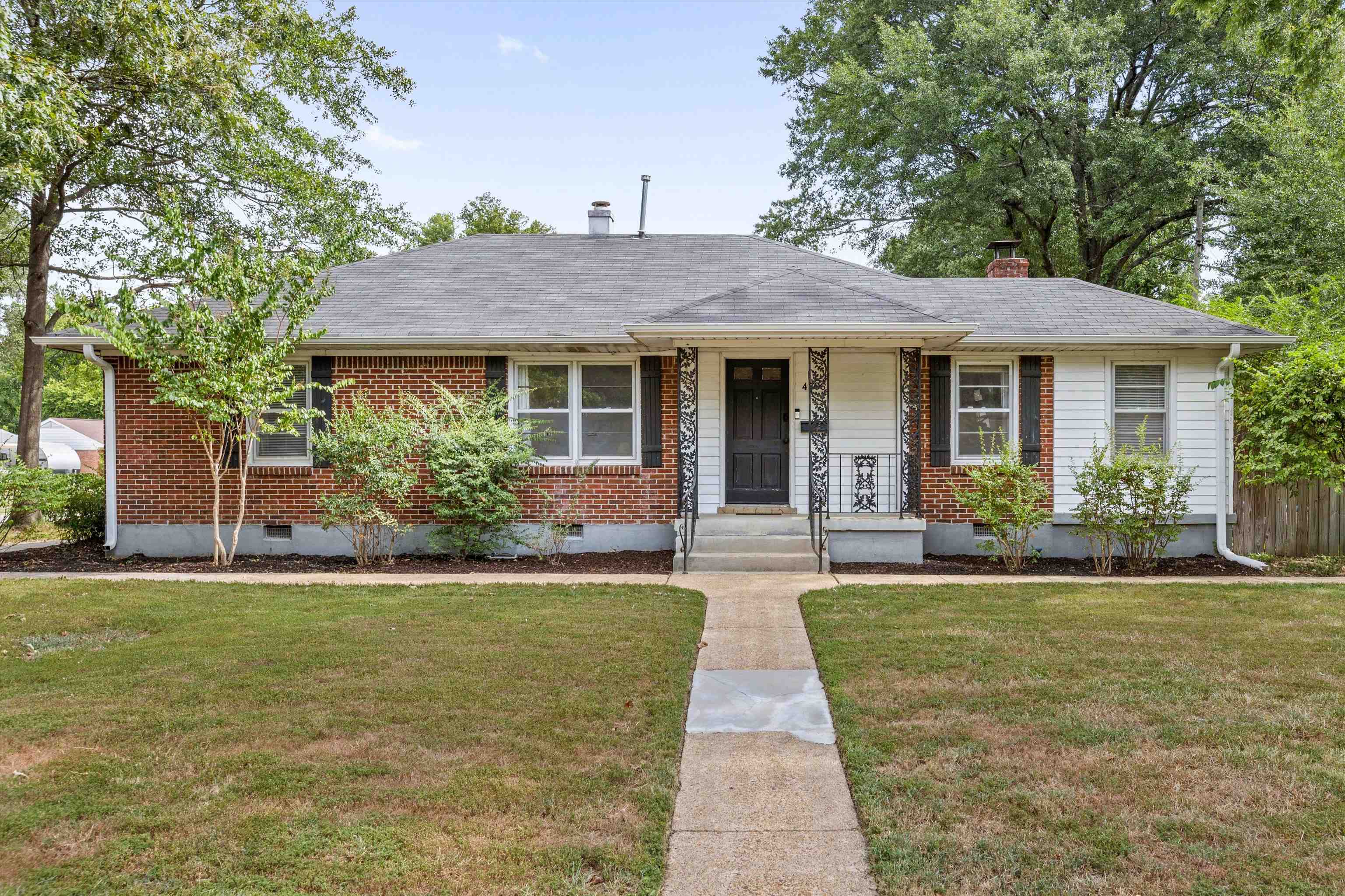 4506 Verne Road Memphis, TN 38117 - Photo 2 of 40 a front view of a house with a yard