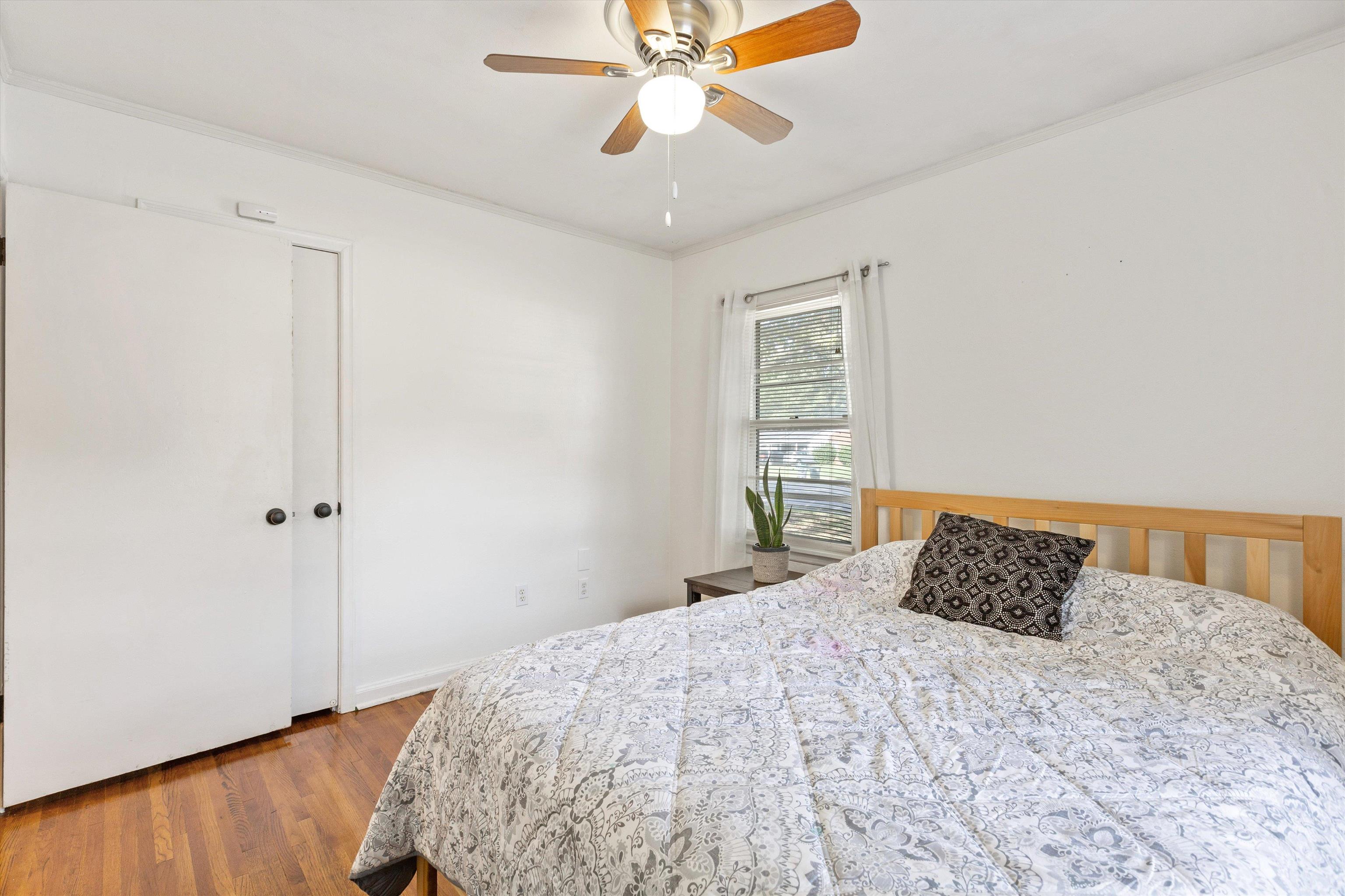 4506 Verne Road Memphis, TN 38117 - Photo 22 of 40 a bedroom with a bed and a window