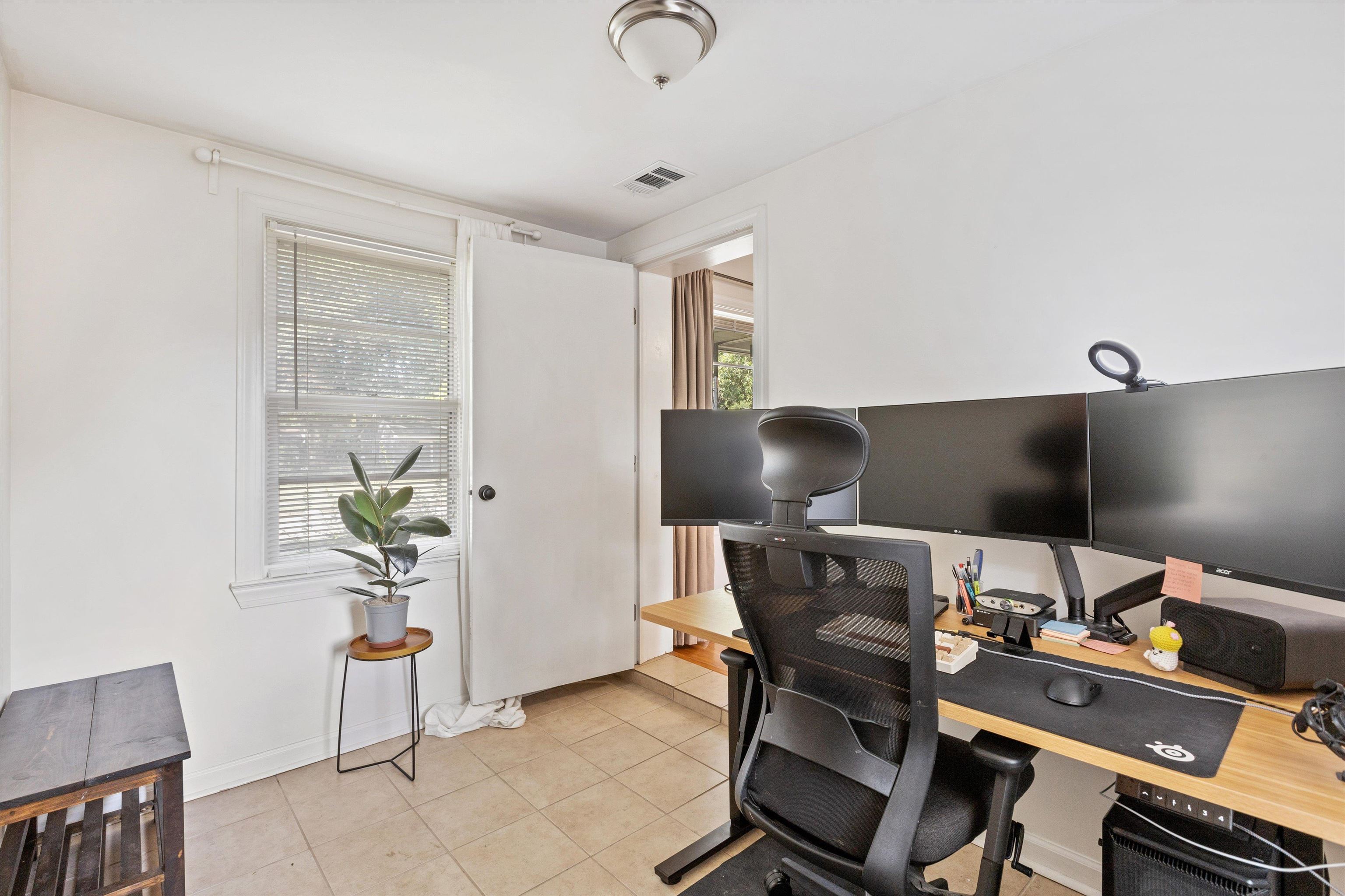 4506 Verne Road Memphis, TN 38117 - Photo 29 of 40 a living room with furniture and a flat screen tv