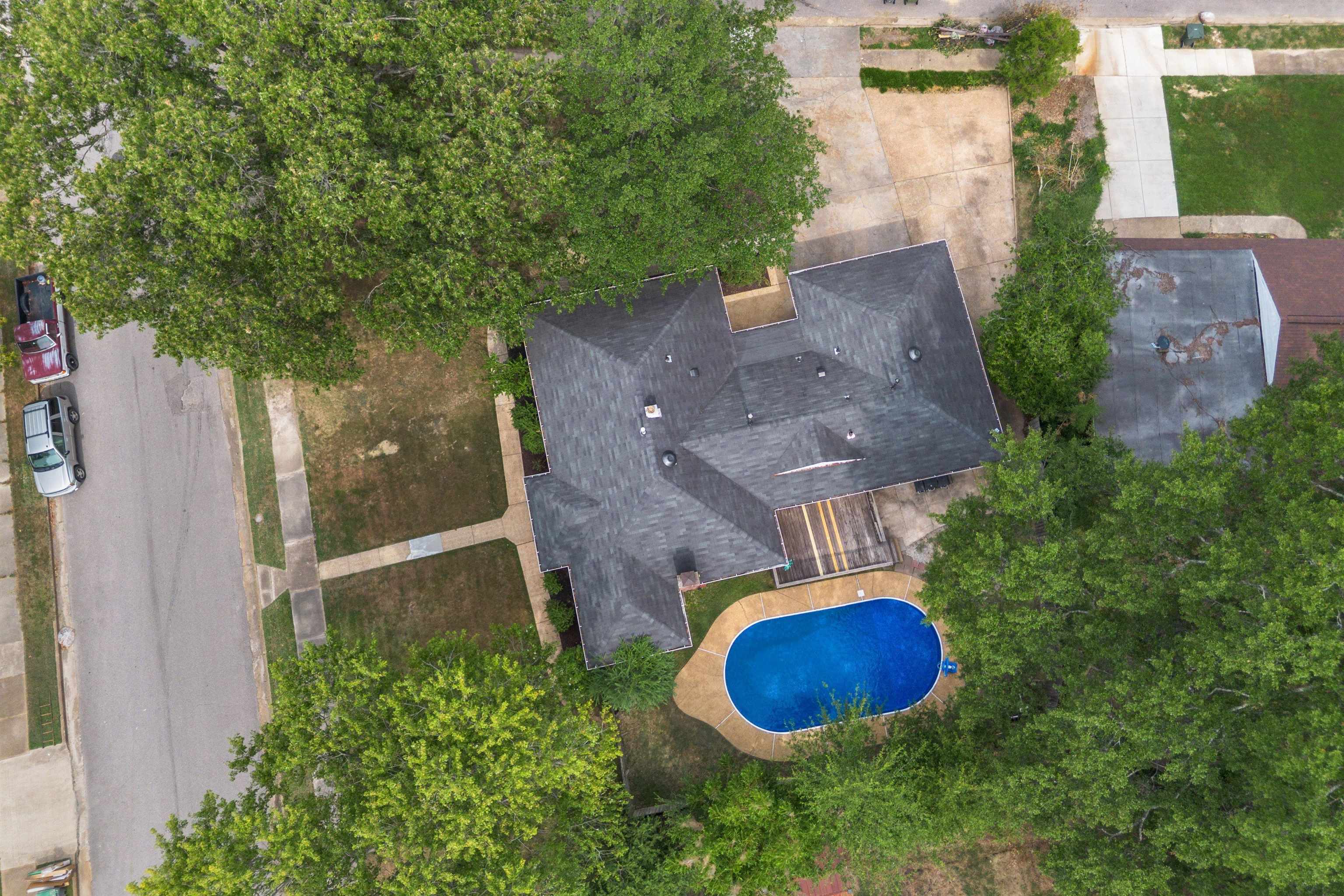 4506 Verne Road Memphis, TN 38117 - Photo 36 of 40 an aerial view of a house with a swimming pool and garden view