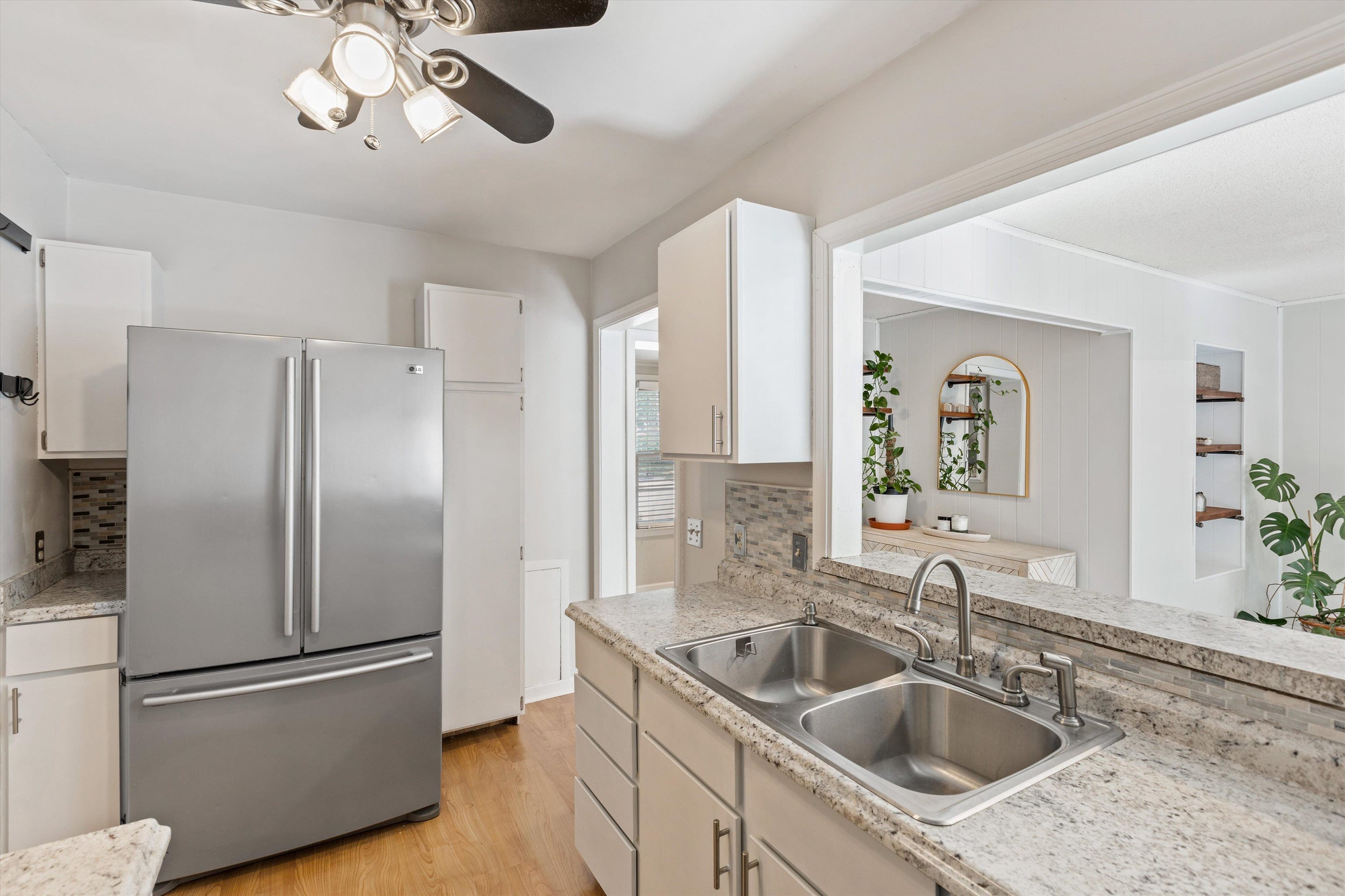 4506 Verne Road Memphis, TN 38117 - Photo 9 of 40 a kitchen with stainless steel appliances granite countertop a refrigerator a sink and a refrigerator